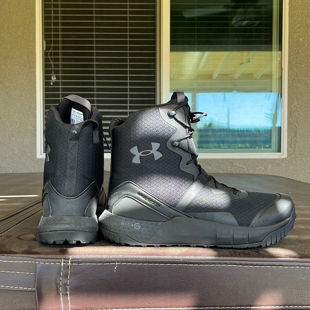Brand new boots never worn. Under Armour size 13 black.